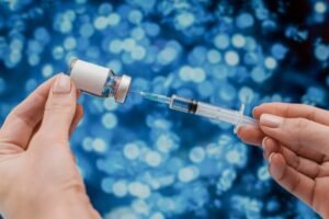 Licensed wellness professional administering peptide injection therapy at H-Bling Wellness in Brea, CA